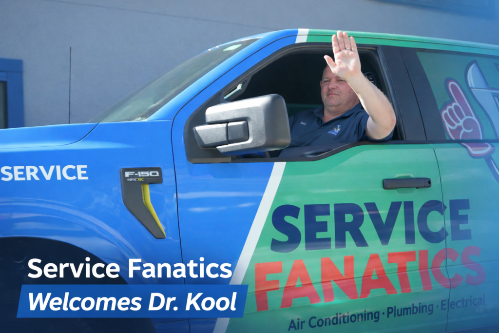 Service Fanatics technician waving from branded HVAC service truck announcing partnership with Dr Kool Air Conditioning in Southwest Florida